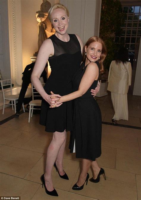 Statuesque Gwendoline Christie Towers Over Diminutive