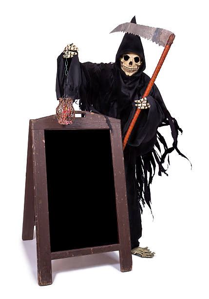 royalty free halloween skeleton holding a blank sign