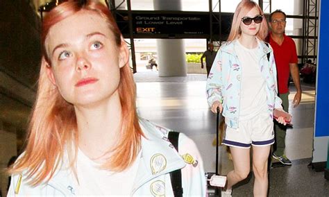 Elle Fanning Catches A Flight Out Of Lax With Her Mother