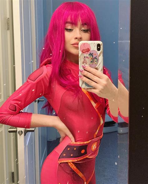 sabrina carpenter dressed up in a lava girl costume for