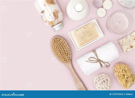 natural spa skincare products  pink background  copy space stock
