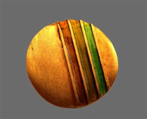 shaped gold tone lapel pin kaleidoscope effect