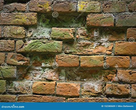 crooked brick walls  missing bricks interesting coloration  years stock