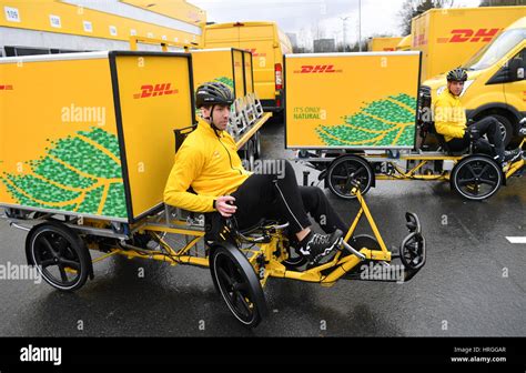 dhl couriers test   environmentally friendly freight bikes  frankfurt  main germany