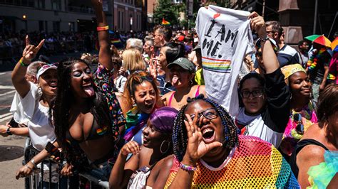 photos pride march brings the brightly colored masses to new york s
