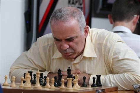 chess kasparov suffers  loss  comeback event  straits