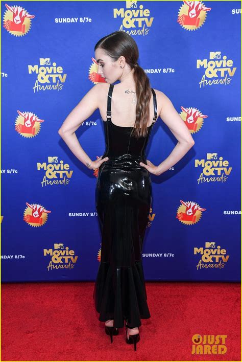 lily collins stuns in latex dress at mtv movie and tv awards