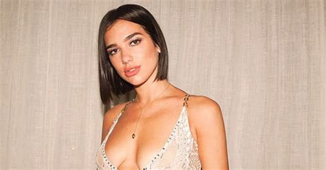dua lipa completely ditches bra in 100 see through dress daily star