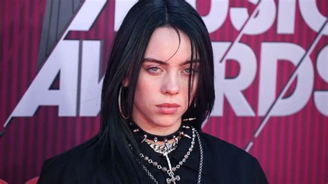 billie eilish   stunning  black dress wearing chains  neck  pink background hd