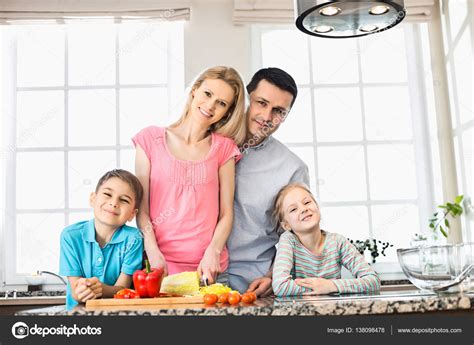 happy family preparing food stock photo  londondeposit