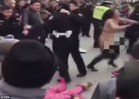 streak fighter woman strips off and attacks police naked after her husband is pulled over for