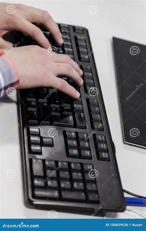 young hacker typing code  computer keyboard stock photo image