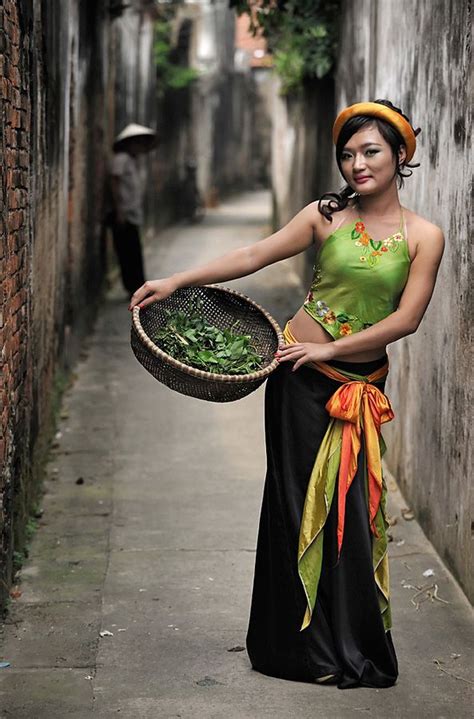 sexy in traditional costume of vietnam women have shown a pass through angles of photographer