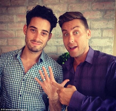 andy cohen reveals he has slept with lance bass on watch