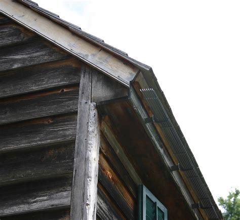 historic house addition cedar roof   rainhandler gutter