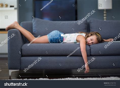 Photo De Stock Girl Sleeping On Sofa Living Room 627987755 Shutterstock