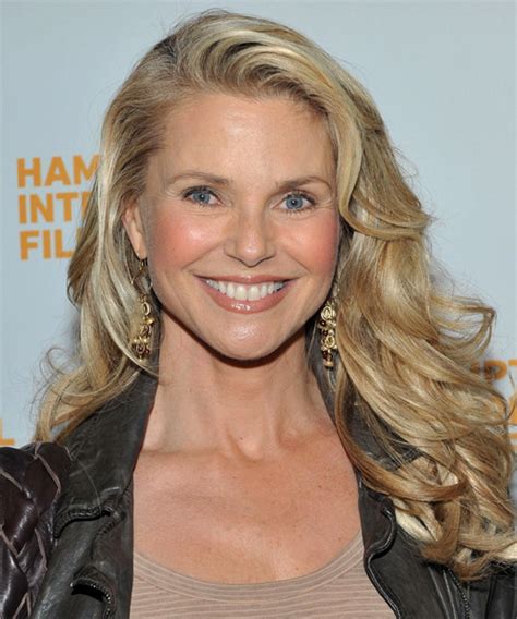 christie brinkley long wavy formal hairstyle blonde hair color with light blonde highlights