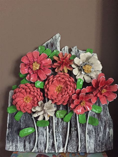 this pin was discovered by deb pine cone crafts flower crafts pine