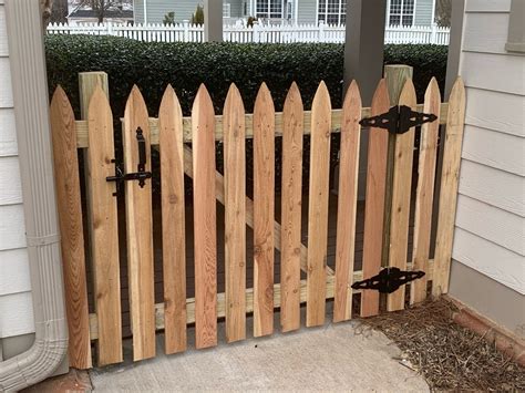 cedar picket fence   wood single walk gate natural enclosures