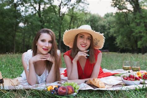 Young Attractive Girls On A Picnic In A City Park Stock Image Image