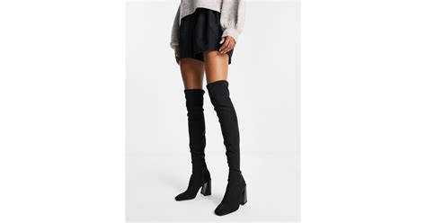 bershka over the knee slouchy heeled boot in black lyst