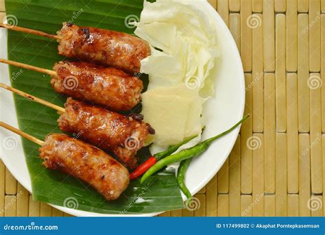 Grilled Thai Sausage Stuffed Rice And Pork Eat With Chili On Plate