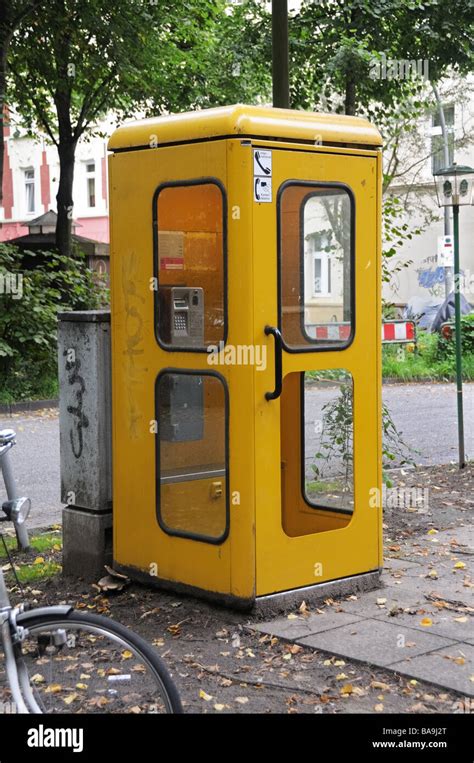 yellow callbox call box phone telefonzelle  altona hamburg germany stock photo alamy