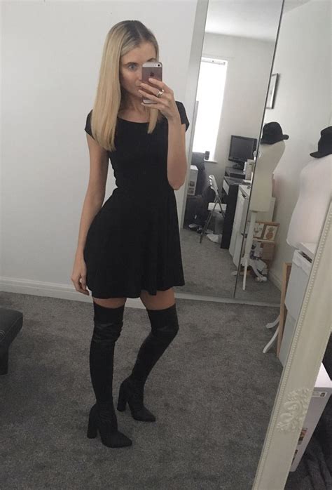 Black Thigh Boots Combined With A Short Black Dress