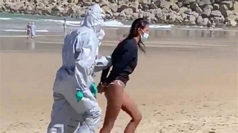 Woman Arrested On Beach After Going Surfing While Infected With
