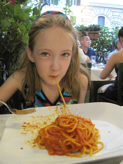 eating spaghetti  roma    family