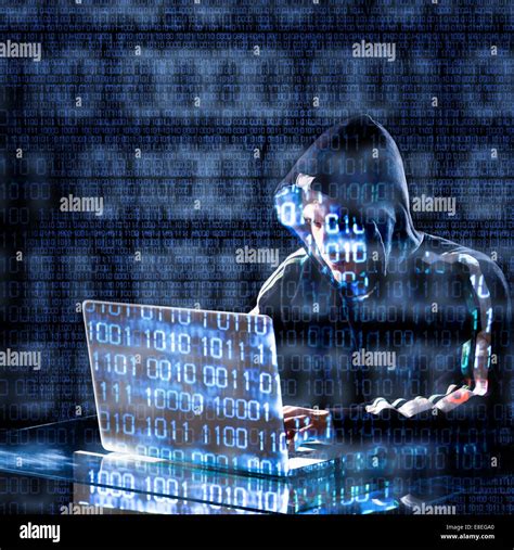 hacker typing   laptop  binary code  background stock photo