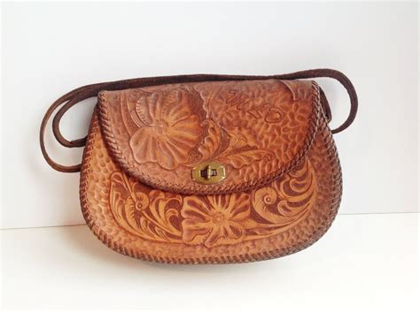 items similar  vintage mexican hand tooled leather purse mld  etsy