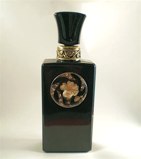 french perfume bottle black  flower medallion scent bottle