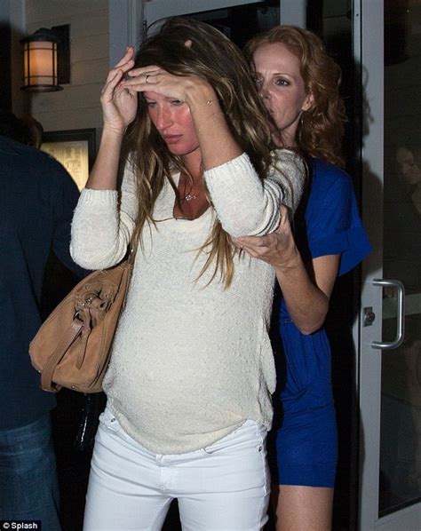 pregnant gisele bundchen shields her face following a night out to