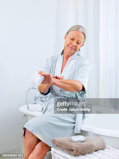 Older Woman Showering Photos And Premium High Res Pictures Getty Images