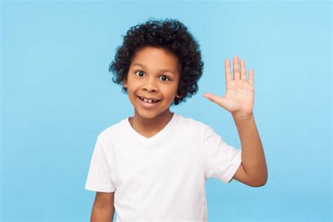 kids waving stock  pictures royalty  images istock
