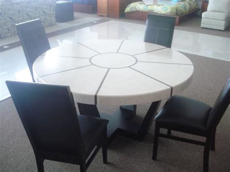person marble  dining table  vallartas