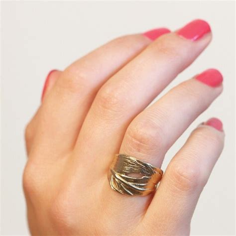 chupi gold swan feather ring feather ring gold swan rings