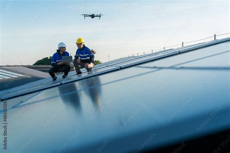 specialist technician professional engineercontrol drone checking top view  installing solar