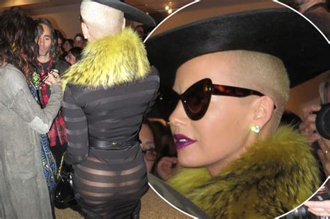 amber rose flashes her bum in tiny thong and see through