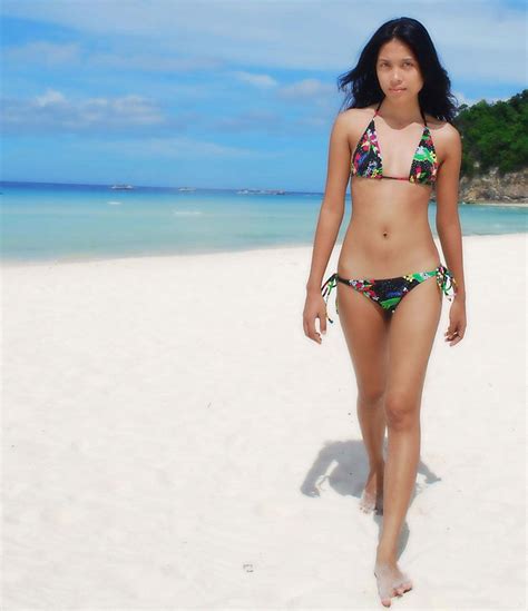 girls wearing roxy bikini on boracay beach in the