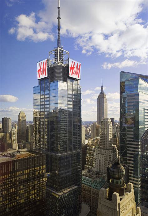 hm signs atop  times square  change  york city skyline huffpost