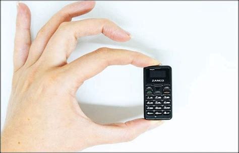 worlds smallest cell phone   tiny   accidentally swallow   tv