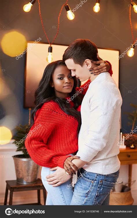 Young Interracial Couple In Love On Valentines Day Posing While