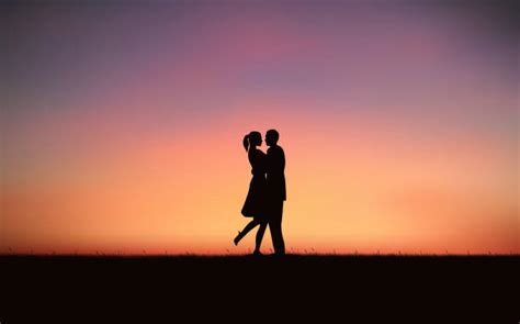 Royalty Free Silhouette Of The Romantic Couple Kissing