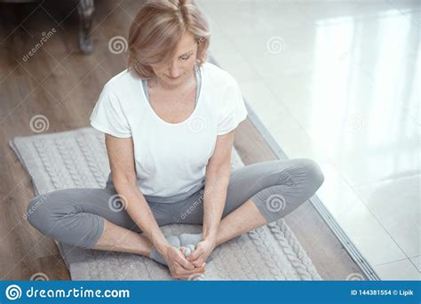 woman  sitting  crossed legs yoga pose stock photo image