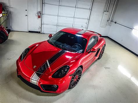 porsche cayman in for a full avery red chrome vinyl wrap and ceramic
