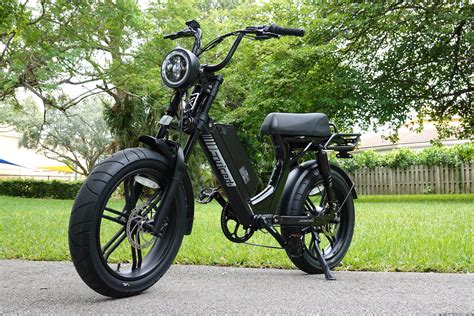 juiced scorpion electric bike review  affordable  moped  style