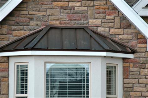 install  metal roof   bay window ferkeybuilders