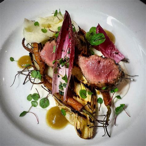 lamb cannon orange and bourbon braised chicory pear almond